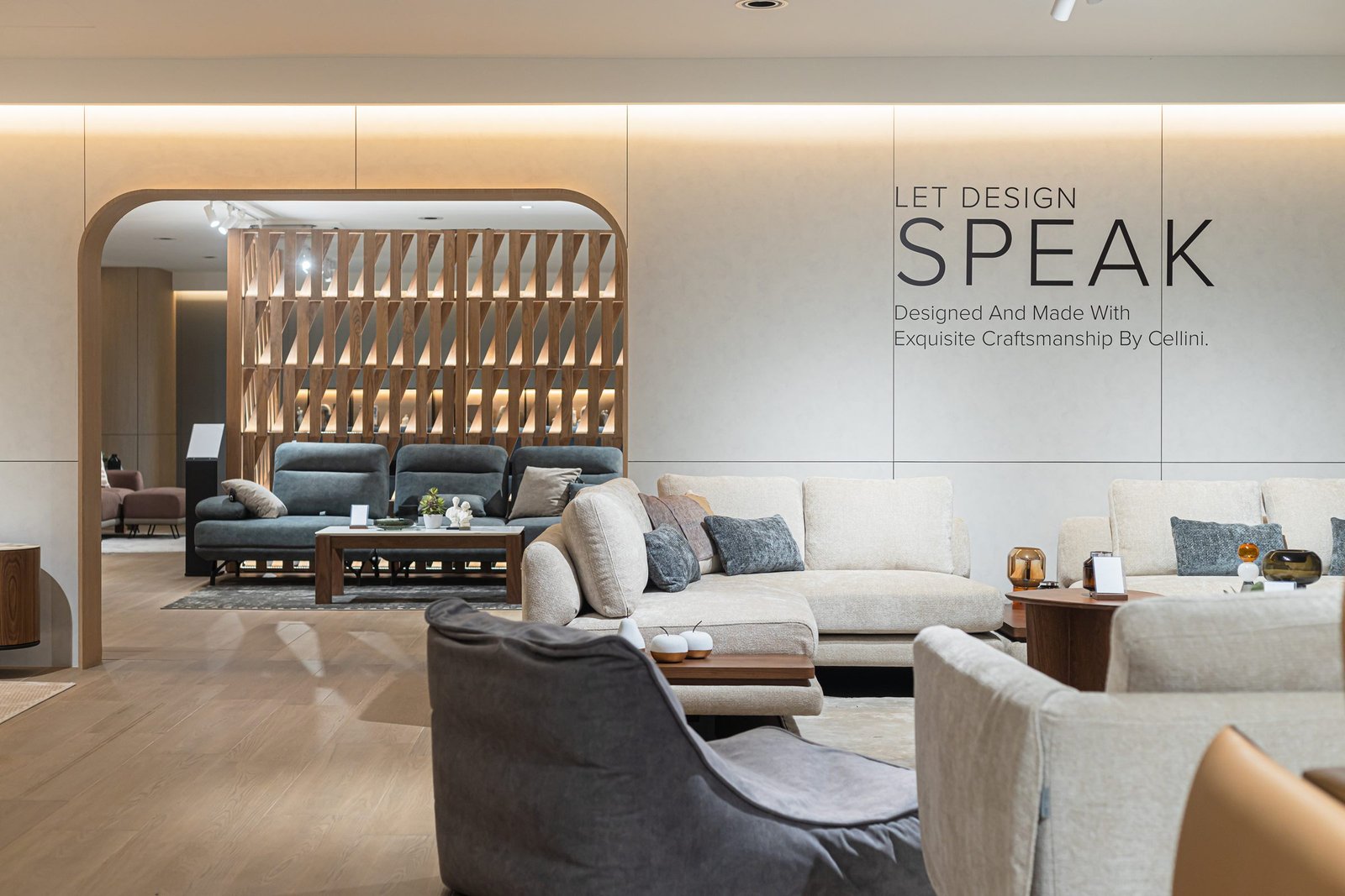 Arched portal and Let Design Speak graphic wall