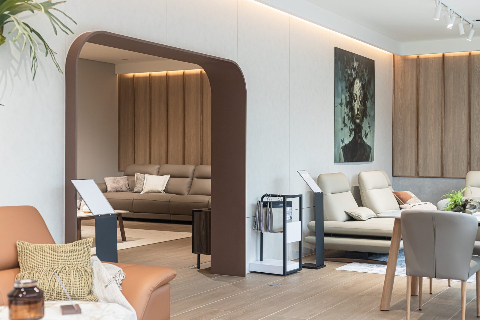 Timber arch framing a sofa vignette